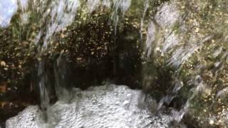 flowing water under an overpass - 1080p 60 fps - Free stock footage