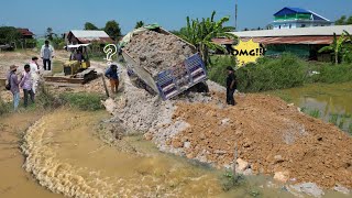 Massive Dump Truck Action! Overloading Soil to Fill Pond for New Landfill Project!