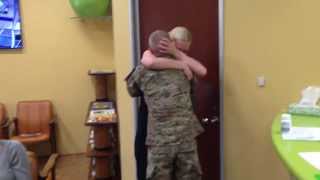 Sister can't stop hugging her brother after he surprises her by coming home from Afghanistan early