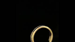 Round brilliant diamonds channel-set in 18kt yellow gold