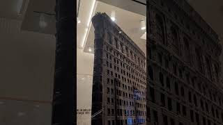 Neuhaus in Hudson yards is displaying an 8 foot high Flatiron Building in dark chocolate.