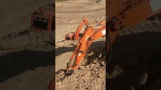 new doosan  and volvo excavators    working with dumpers