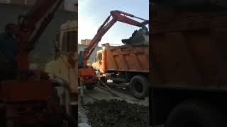 Tractor excavator at work