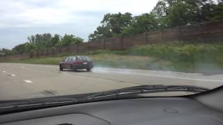 Smoking car on the freeway