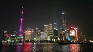 Pudong Shanghai Night Light Up with Passing Boats