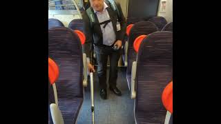 Graham Simpson MSP demonstrates Cross-Country's vacuum cleaner