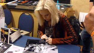 Cherie Currie of The Runaways signing autographs - TopSignatures.com