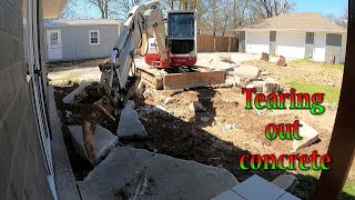 Tearing Out A Concrete Patio And Grading A Driveway And Yard