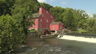 What makes the Red Mill Museum Village a fan favorite?