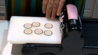 Flattening 6 Bottlecaps using Sizzix Big Shot and No More Shims