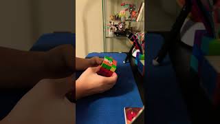 A trick  to impress her friends with Rubiks ￼ cube