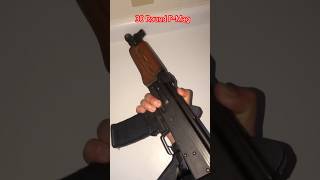 M85 NP AK-style pistol (Zastava) 5.56x45mm NATO feeding AR magazines.