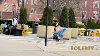 Driving a lawn chair.  Only at Purdue