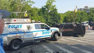 Overturned car blocking intersection