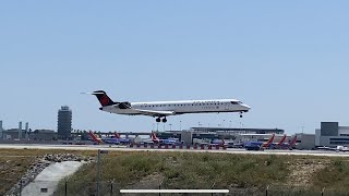 Air Canada Express Mitsubishi CRJ-900LR landing at Los Angeles International Airport KLAX runway 24R