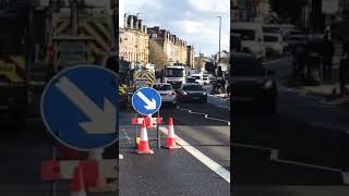 Mercedes truck transporting TWO mini excavators