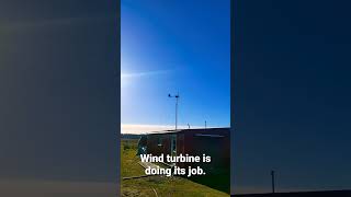 wind turbine doing its job, coming  electra in house