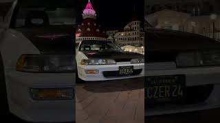 93 Acura Integra sitting proper in front of the iconic Hotel Del Coronado.