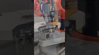 KUKA Robot with automatic tool changer for enhanced robotic milling.