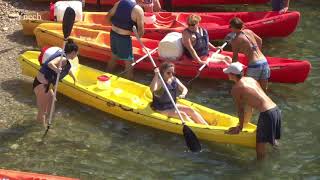 Kayaking tour and cable car at the walls of the old town of Dubrovnik.