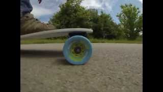 Longboard with Seismic Blast Wave wheels