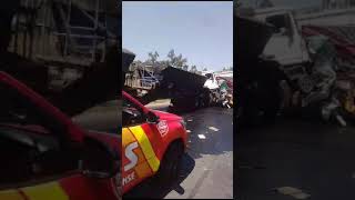 Aftermath of collision between 2 side tipper trucks on N12 W at Snake road bridge