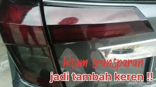 pasang sticker hitam transparan/hybrid/smoke, di kaca lampu toyota calya