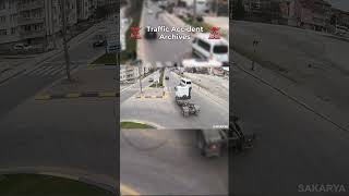 Shocking Footage of Car Crashing into a Truck Driver Giving Way to Pedestrians at a Zebra Crossing