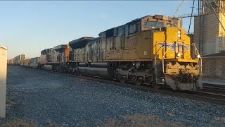 A WORN UP SD70ACE  leads a fast Intermodal train