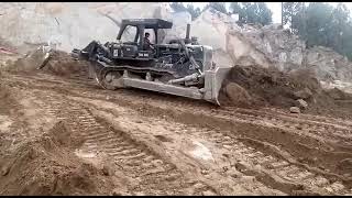 Caterpillar D8 dozer removing over burden