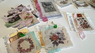 Junk journal dangles using scraps // using rub-ons with fabric / journal ephemera idea