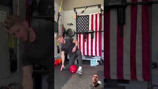 Half kneeling medball slams