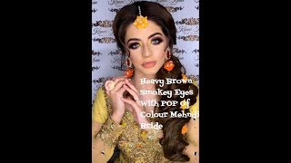 Heavy Brown Smokey Eyes With POP Of Colour Mehndi Bride