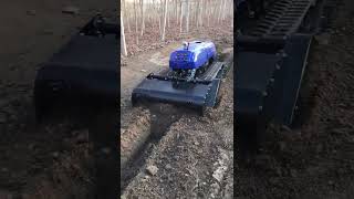 China made Automower with soil backfiller attachment