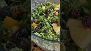 Raw vegan kale salad with raw tahini sauce. I mixed it with orange juice.