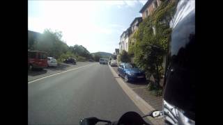 R1 almost smashes into a small bus