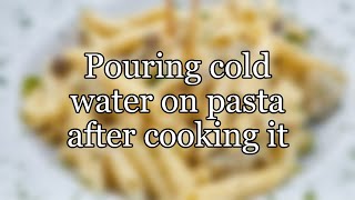 Pouring cold water on pasta after cooking it