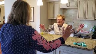 Standing Tai Chi therapy at the kitchen.