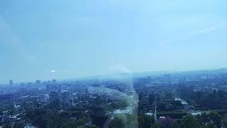 Los Angeles from skyscraper. i tried somehow hide. the hand but it wasn't possible that moment to me