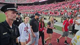 No 3 Ohio State Buckeyes HC Ryan Day leaving field after 35-7 win over Iowa Hawkeyes