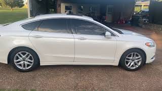 Hyundai with a murdered out tint job