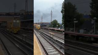 LIRR PTS 62 work train passing by woodside with a hornshow