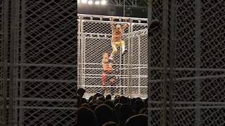 CODY RHODES WITH A CODY CUTTER FROM THE CAGE TO Tribal Chief Solo Sikoa