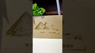 Looking at this picture of the ancient pyramid reproduced using a laser engraving machine.