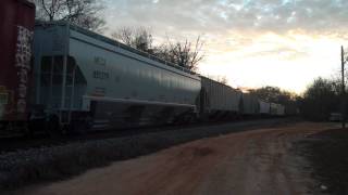 EMD geeps screaming up the hill in Run 8 with a manifest train.