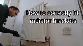 How to correctly fit radiator brackets to a stud wall