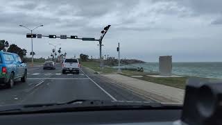 driving in corpus down by the water. please don't text and drive like this lady.