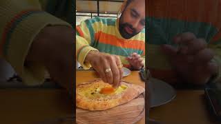 Teaching the perfect way to eat #khachapuri #georgia #kazbegi #stepantsminda #europe #russia #food