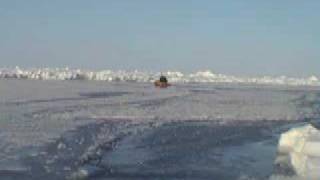 Paddling across very thin ice to the North Pole