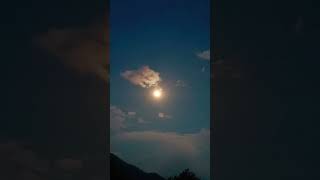 Moon & blue sky, surreal atmosphere and cold breeze of mid summer in the Hamalayas